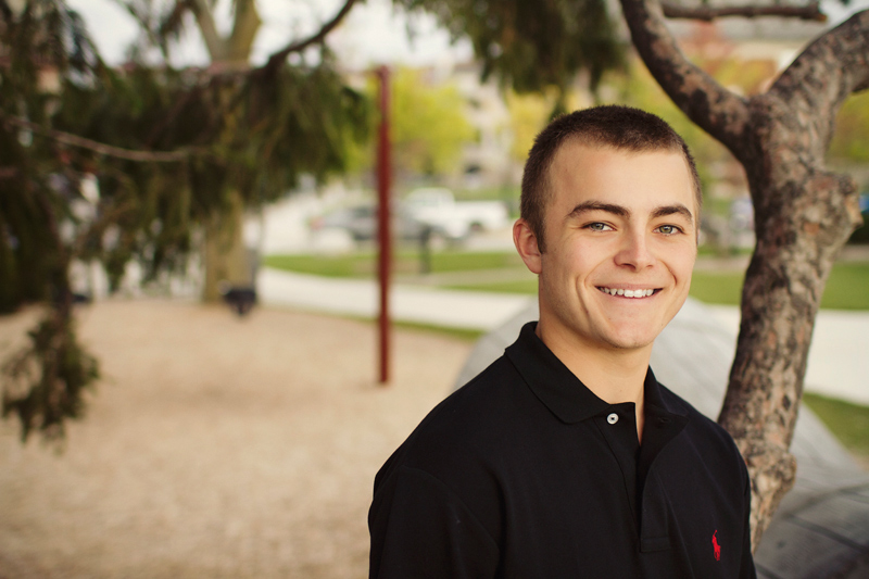 Cool boy senior photo portrait in Mi